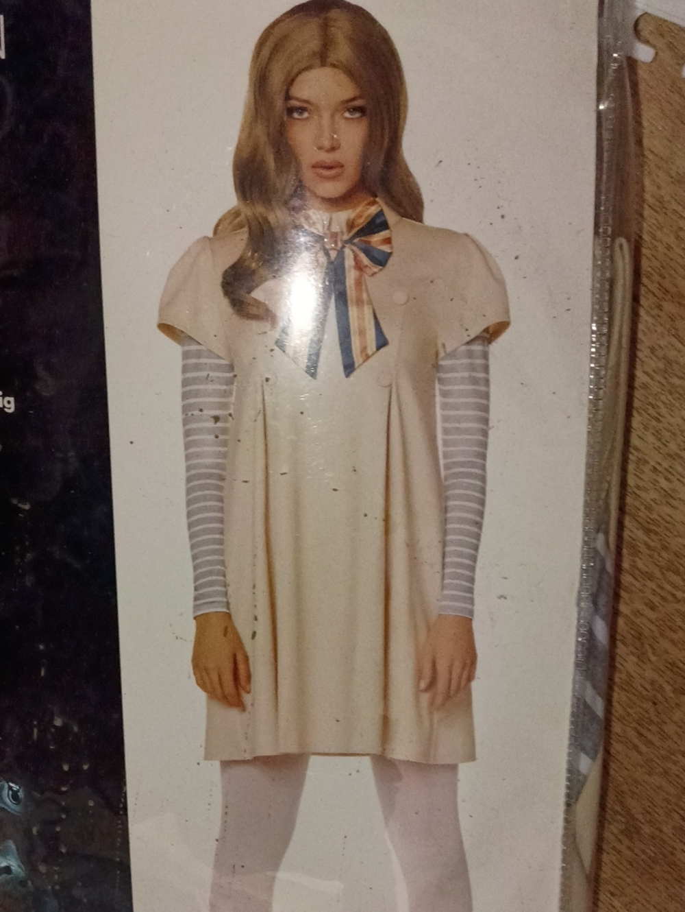 Meghan LA Cream Swing Tunic with Striped Mock Layer and Bow Accent